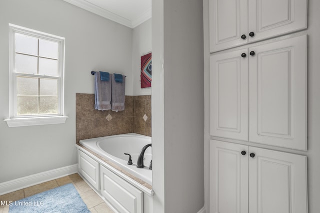 bathroom with crown molding, a washtub, and tile patterned floors