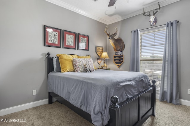 bedroom featuring ceiling fan, ornamental molding, and carpet