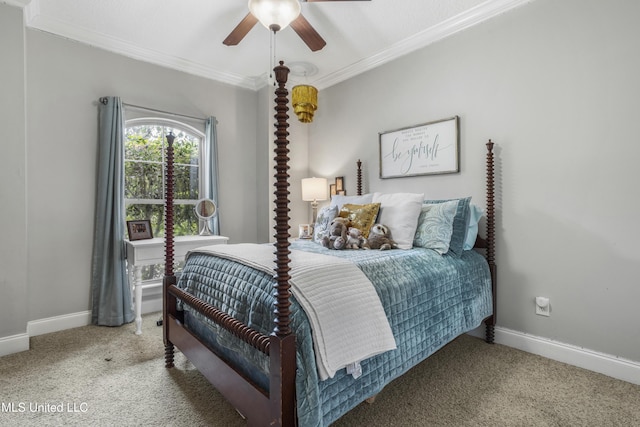 bedroom with crown molding, ceiling fan, and carpet floors