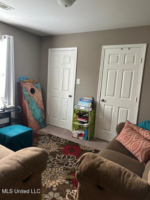 15501 Quail Creek Cv, Diberville, MS 39540 - sitting room with light carpet