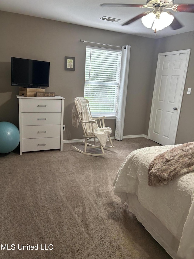 15501 Quail Creek Cv, Diberville, MS 39540 - carpeted bedroom featuring baseboards and ceiling fan