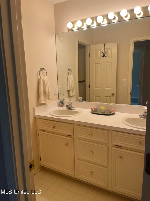 bathroom featuring vanity and tile patterned floors