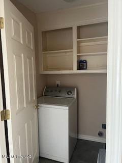 clothes washing area with washer / clothes dryer