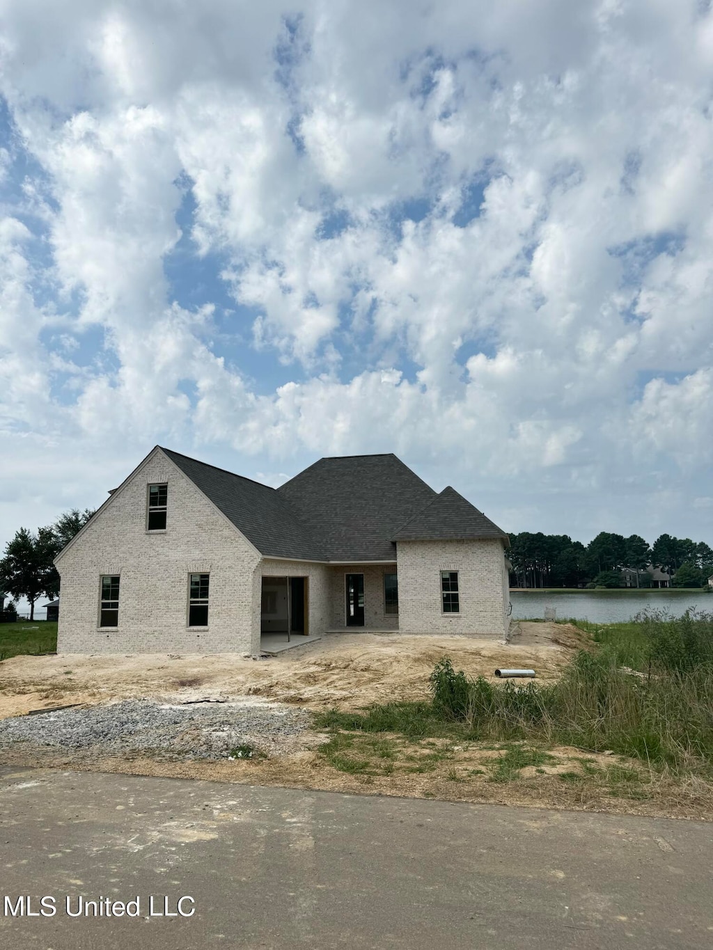 view of front of house featuring a water view