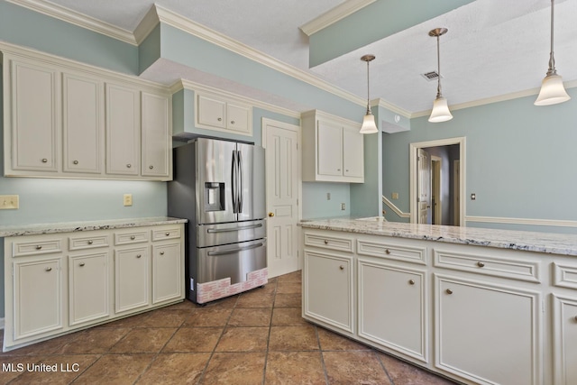 1034 Northpointe Dr, Jackson, MS 39211 - kitchen with stainless steel fridge with ice dispenser, pendant lighting, crown molding, light stone counters, and cream cabinetry
