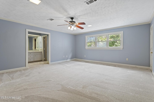 1034 Northpointe Dr, Jackson, MS 39211 - unfurnished bedroom featuring ornamental molding, light colored carpet, a textured ceiling, baseboards, and ensuite bathroom
