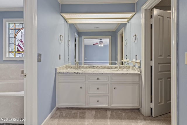 1034 Northpointe Dr, Jackson, MS 39211 - full bath with double vanity, a ceiling fan, ornamental molding, a tub to relax in, and baseboards