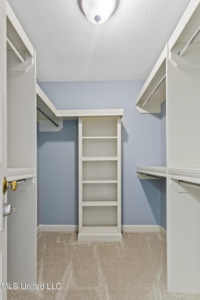 1034 Northpointe Dr, Jackson, MS 39211 - walk in closet featuring carpet