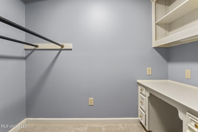 1034 Northpointe Dr, Jackson, MS 39211 - laundry room featuring baseboards and carpet