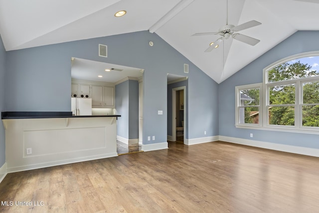 1034 Northpointe Dr, Jackson, MS 39211 - unfurnished living room featuring wood finished floors, ceiling fan, baseboards, high vaulted ceiling, and recessed lighting
