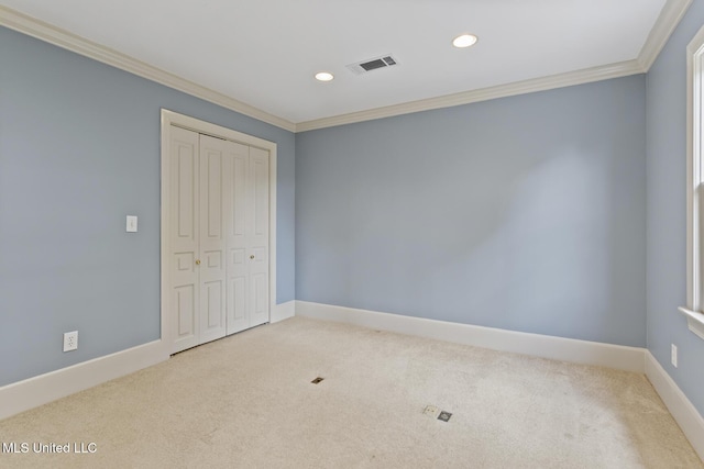 1034 Northpointe Dr, Jackson, MS 39211 - unfurnished bedroom with ornamental molding, recessed lighting, carpet, a closet, and baseboards