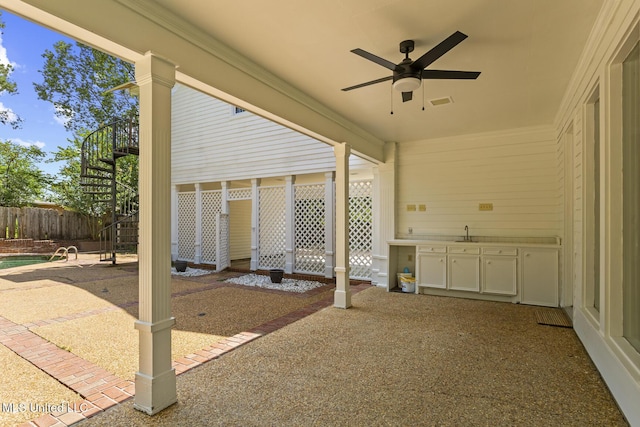 1034 Northpointe Dr, Jackson, MS 39211 - view of patio / terrace with a ceiling fan, stairs, and a sink
