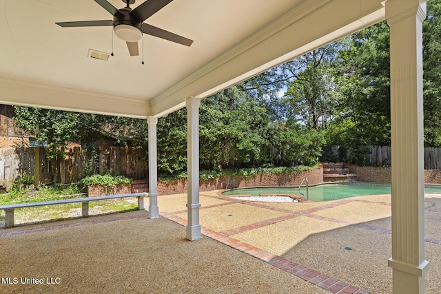 1034 Northpointe Dr, Jackson, MS 39211 - fenced backyard featuring a patio, a ceiling fan, and a pool with connected hot tub