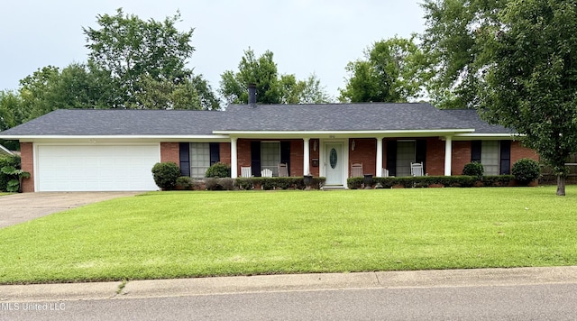 ranch-style home featuring brick siding, a garage, a porch, concrete driveway, and a front lawn