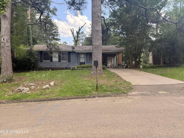 1557 Maria Dr, Jackson, MS 39204 - ranch-style house featuring concrete driveway, a front lawn, and a carport