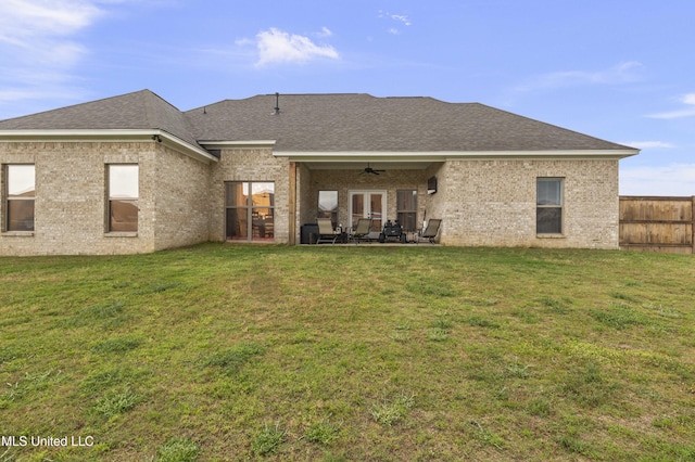 970 Glenwild Cir, Canton, MS 39046 - back of house with a ceiling fan, a patio area, brick siding, and roof with shingles