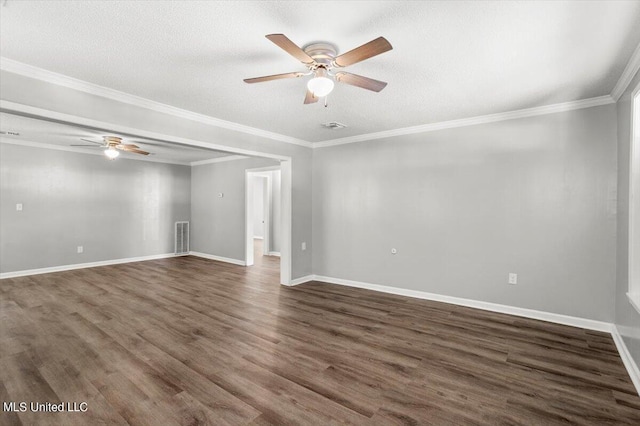 unfurnished room with ornamental molding, dark wood-type flooring, ceiling fan, and a textured ceiling