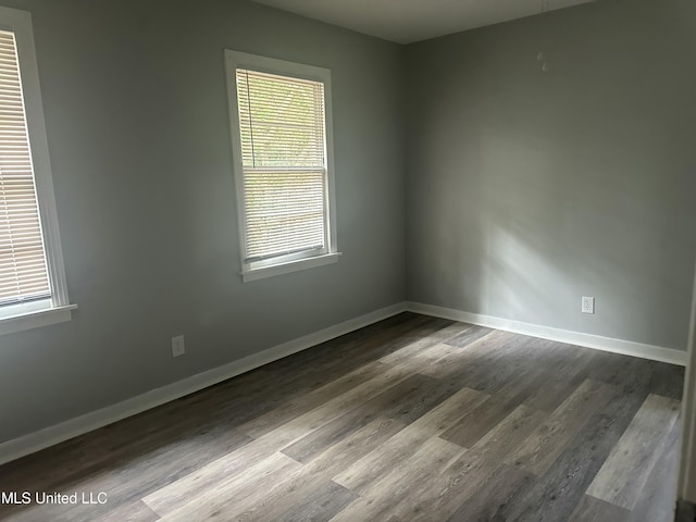558 Daniel Cir, Jackson, MS 39212 - unfurnished room featuring wood finished floors and baseboards