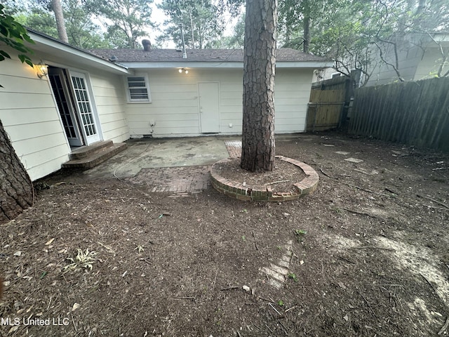 558 Daniel Cir, Jackson, MS 39212 - back of house with a patio area and entry steps