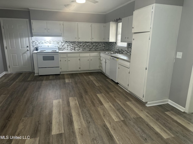 558 Daniel Cir, Jackson, MS 39212 - kitchen featuring white appliances, a sink, dark wood-style flooring, crown molding, and decorative backsplash