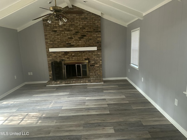558 Daniel Cir, Jackson, MS 39212 - unfurnished living room with ceiling fan, wood finished floors, a brick fireplace, and baseboards