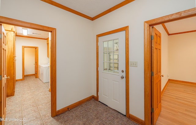 4005 Warriors Trl, Vicksburg, MS 39180 - entrance foyer featuring ornamental molding, baseboards, tile patterned flooring, and washer and dryer