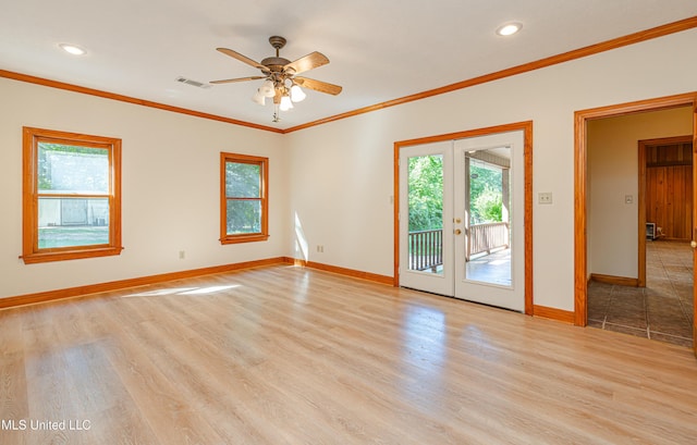 4005 Warriors Trl, Vicksburg, MS 39180 - spare room with french doors, baseboards, light wood-style floors, a ceiling fan, and recessed lighting