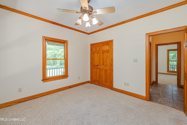 4005 Warriors Trl, Vicksburg, MS 39180 - unfurnished room with carpet flooring, baseboards, ornamental molding, and ceiling fan