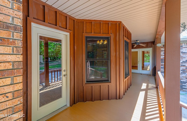 4005 Warriors Trl, Vicksburg, MS 39180 - property entrance with board and batten siding, french doors, and ceiling fan