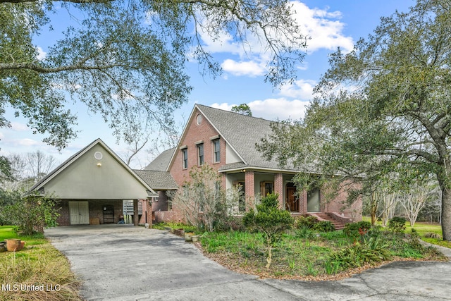 view of front of home featuring a carport