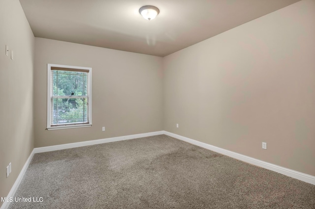 unfurnished room featuring carpet floors