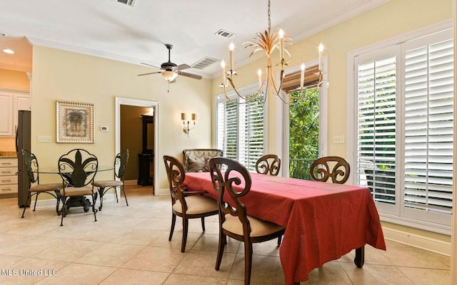 tiled dining area featuring ornamental molding, ceiling fan with notable chandelier, and a wood stove