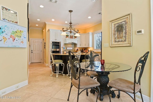 tiled dining space with crown molding