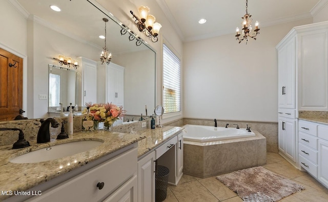 bathroom featuring vanity, a wealth of natural light, tile patterned floors, and tiled bath