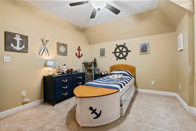 bedroom with lofted ceiling, light colored carpet, and ceiling fan