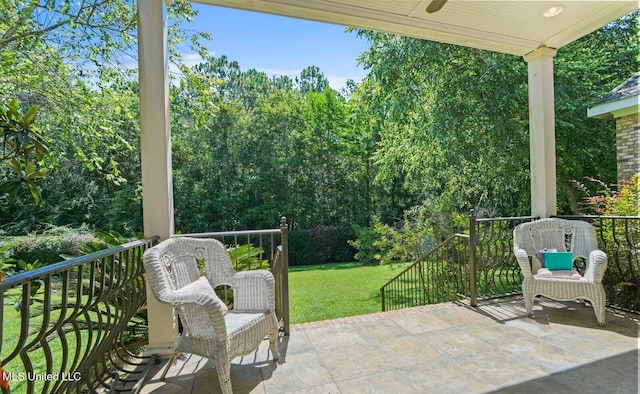 view of patio / terrace featuring ceiling fan