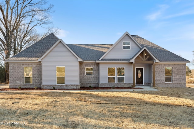 view of front of house with a front lawn