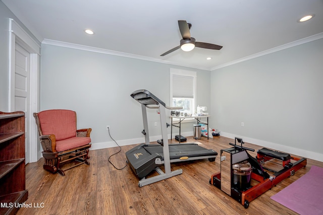 workout area with baseboards, ornamental molding, recessed lighting, and wood finished floors