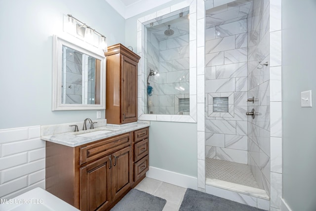 bathroom featuring vanity, a walk in shower, and tile patterned flooring