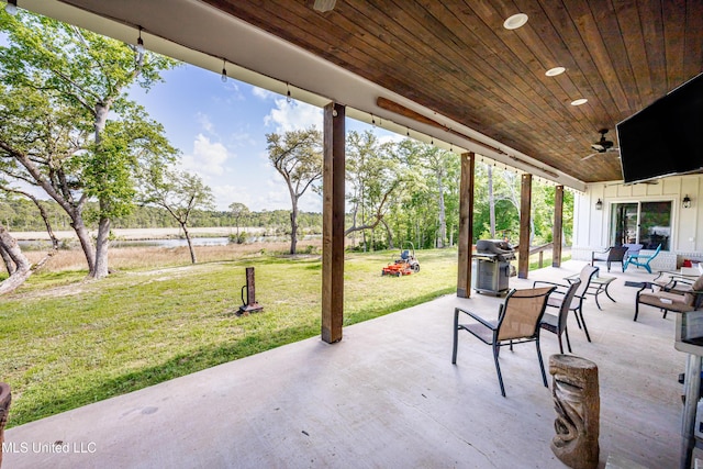 view of patio / terrace featuring ceiling fan and a grill