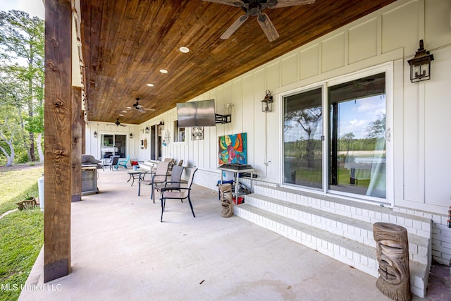 view of patio featuring entry steps and a ceiling fan