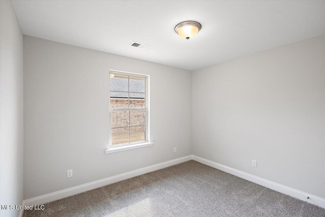 view of carpeted spare room