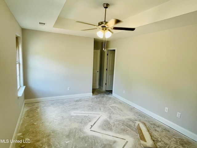 unfurnished room with ceiling fan