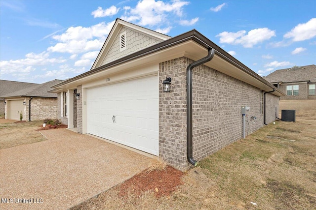 view of side of home featuring central AC and a garage