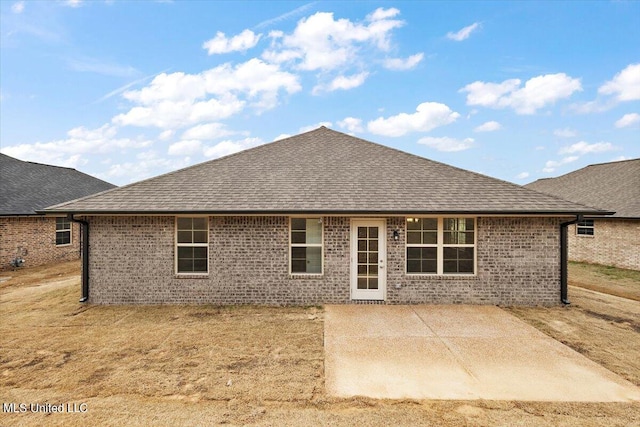 rear view of house with a patio