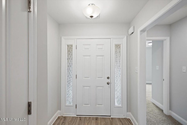 entrance foyer featuring light hardwood / wood-style flooring