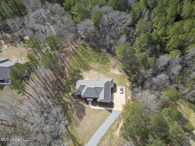 bird's eye view with a forest view