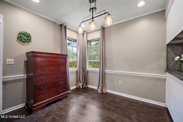 bedroom featuring crown molding and dark hardwood / wood-style flooring