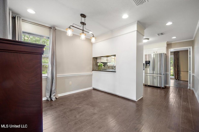 interior space with decorative backsplash, white cabinetry, dark hardwood / wood-style floors, and stainless steel fridge with ice dispenser