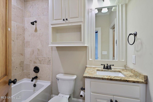 full bathroom featuring vanity, toilet, and tiled shower / bath combo